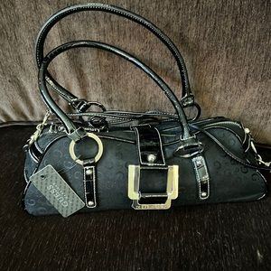 Guess by Marciano black purse new with tags and dust bag